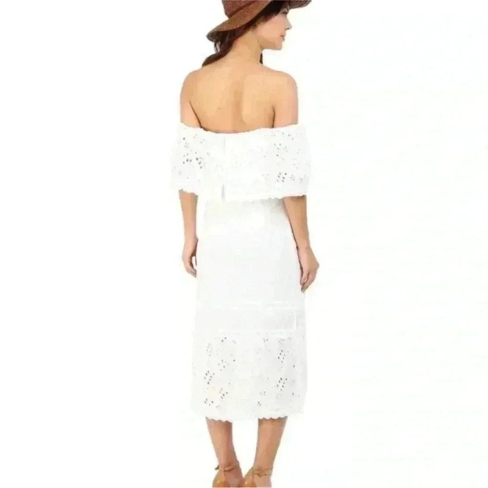 Free People breezy white cotton dress features an off-the-shoulder dress
